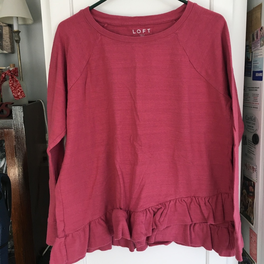 Pink sweatshirt material too with asymmetrical bottom. Size large
